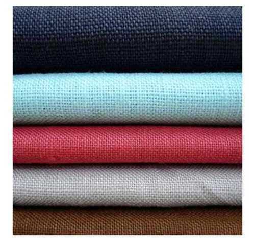 Cotton fabric is a soft, natural textile made from the fluffy fibers surrounding the seeds of the cotton plant