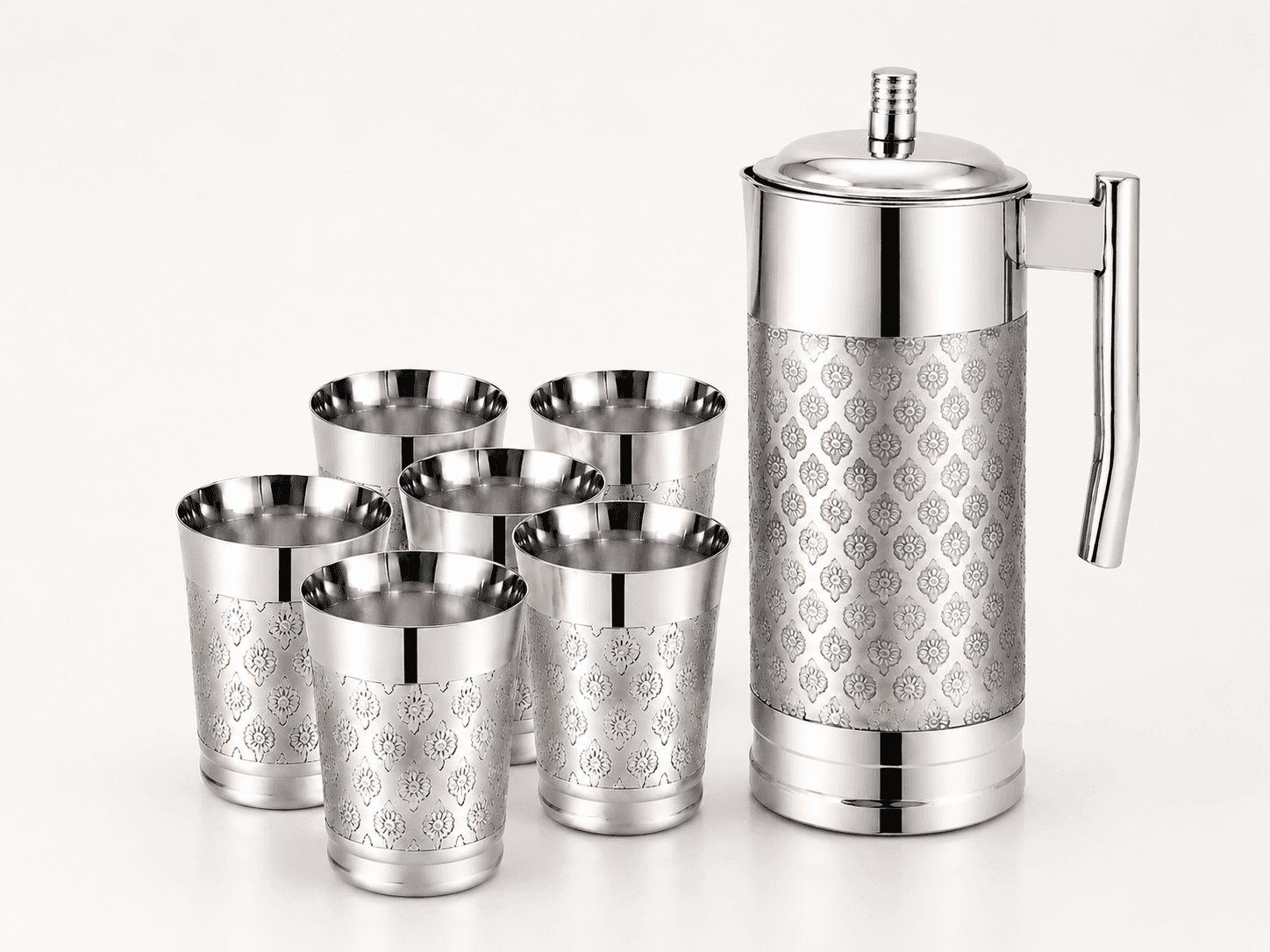 An elegant Stainless Steel Lemon Set featuring a beautifully matching patterned water jug and tumbler glasses